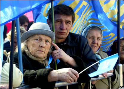 Yanukovych supporters listen to their leader during a rally in Kiev.